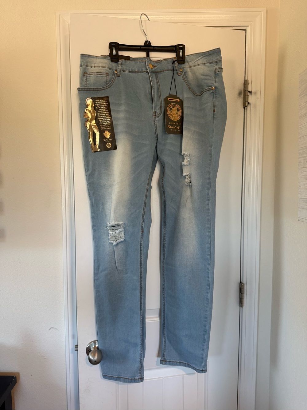 Classic Light Blue Straight Leg Jeans with Subtle Distressing